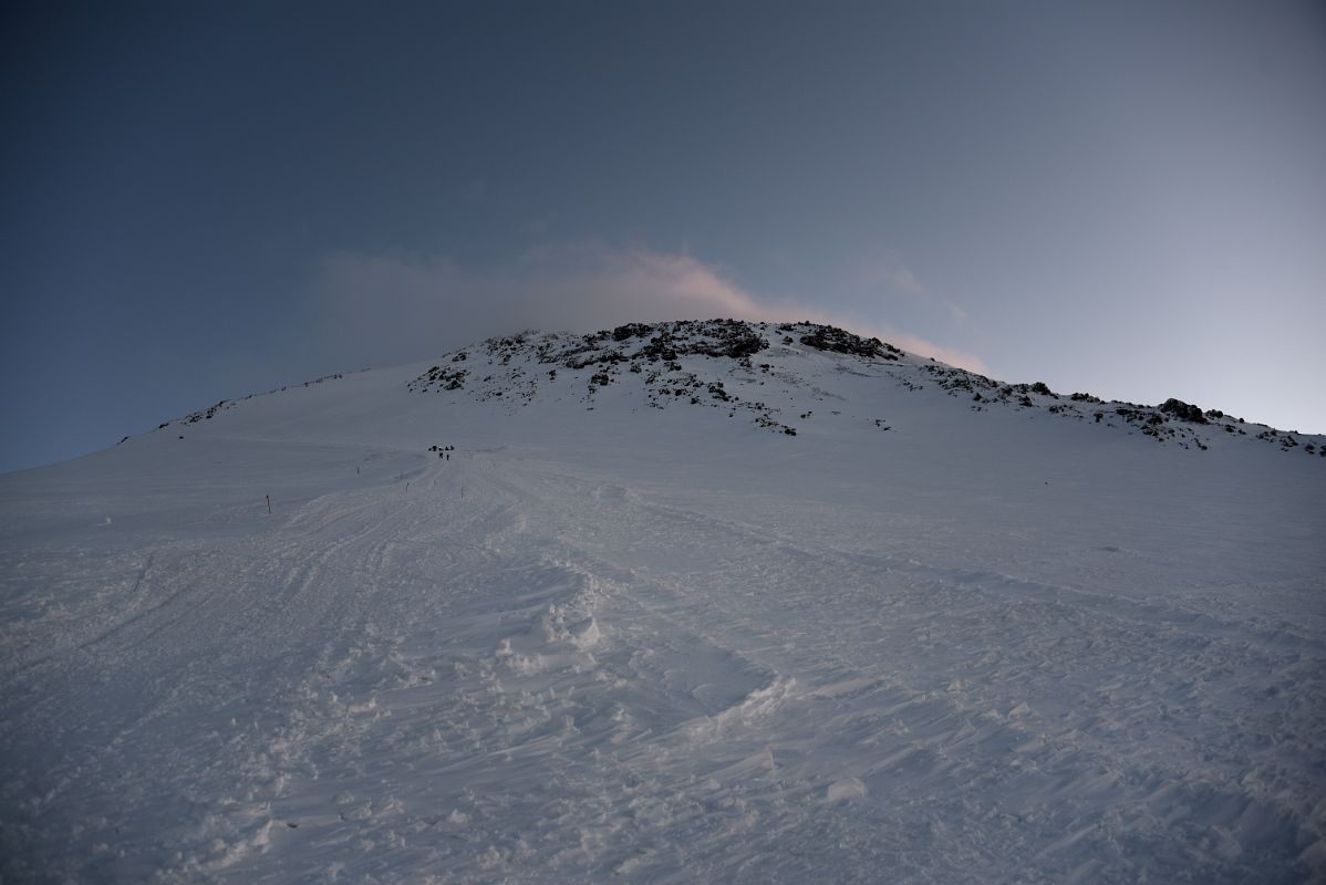 03A Looking Up At The Steep Trail To The Traverse With Mount Elbrus East Summit Above At Sunrise From Mount Elbrus Climb